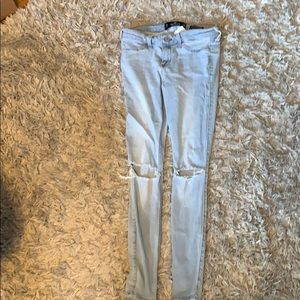 light blue, ripped, low-rise jean legging